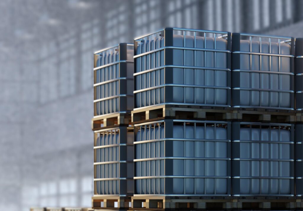 Enterprise warehouse. Interior of storage facility inside hangar. Tanks for liquids on pallets. Plastic storage containers. Chemical liquids warehouse. Chemical tanks are stored on pallets. 3d image